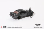 2025 MINI GT #869 Nissan Skyline GT-R (R32) Gunmetal W/ Matsuda Figure Tsugio Matsuda Collection