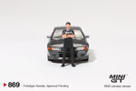 2025 MINI GT #869 Nissan Skyline GT-R (R32) Gunmetal W/ Matsuda Figure Tsugio Matsuda Collection