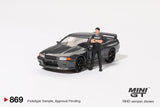 2025 MINI GT #869 Nissan Skyline GT-R (R32) Gunmetal W/ Matsuda Figure Tsugio Matsuda Collection
